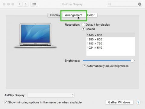 Screenshot of the 'Built-in Display' window highlighting the Arrangement button.